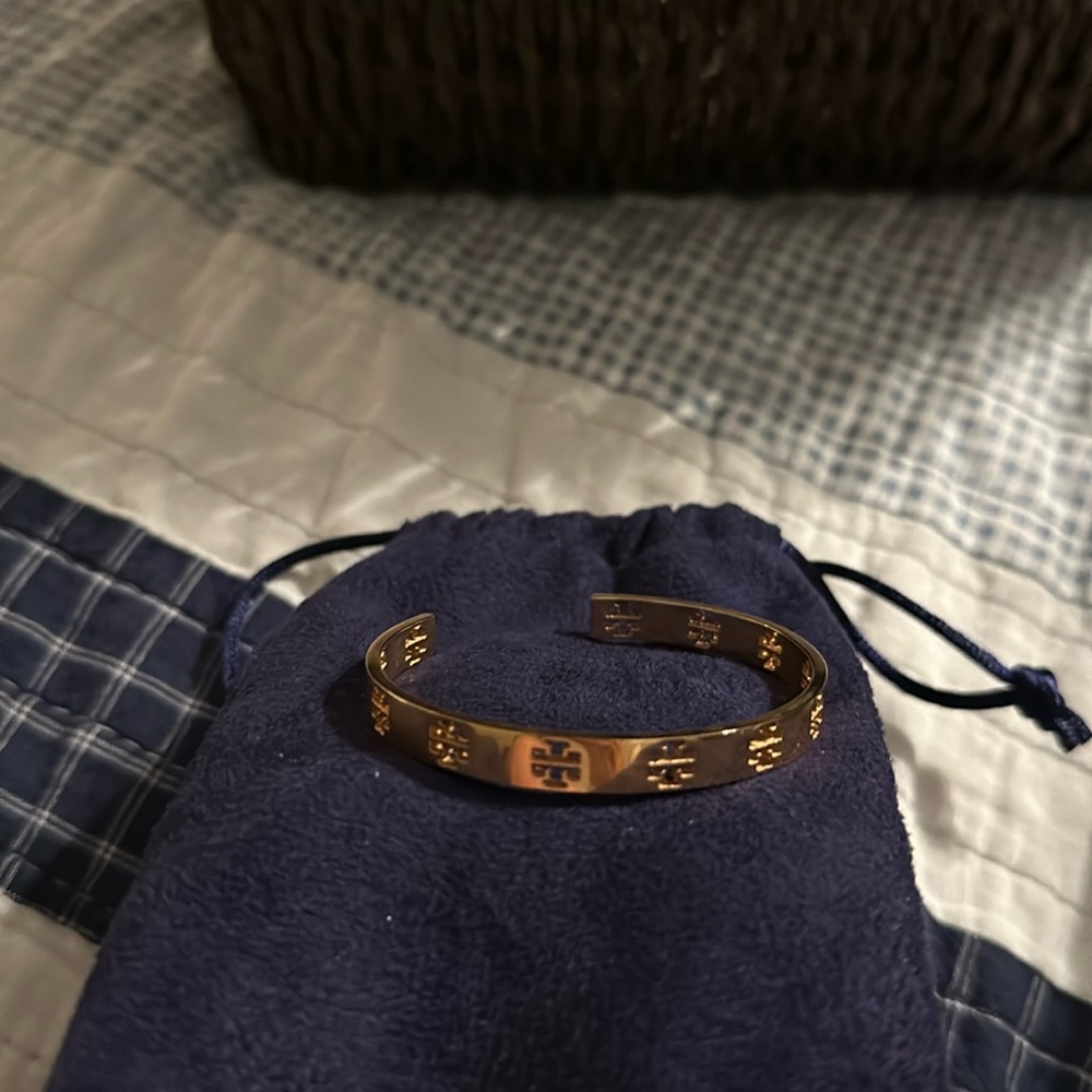 Rose tone Tory Burch cuff. Original Tory Burch bag to hold and shine.